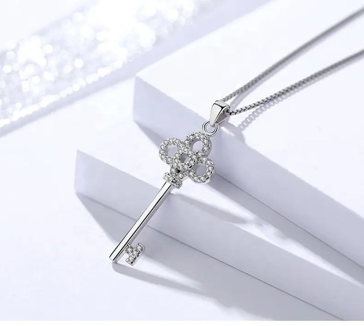 Sterling Silver Rhodium Plated CZ Key Necklace