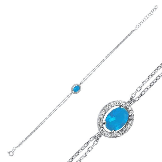 Sterling Silver Rhodium Plated Oval Cyan CZ Bracelet