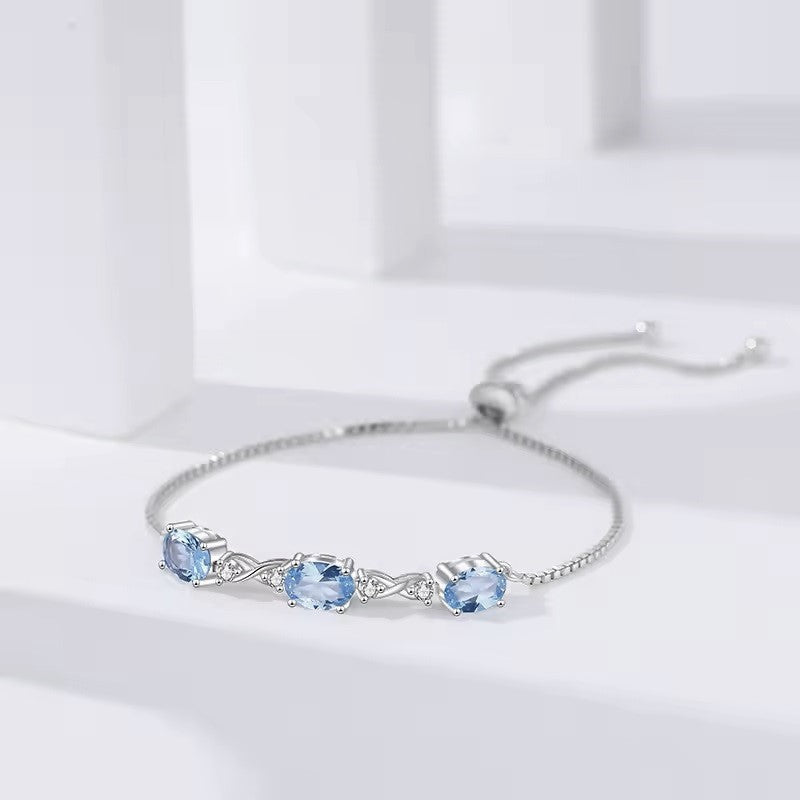 Sterling Silver Rhodium Plated Light Blue CZ Bracelet