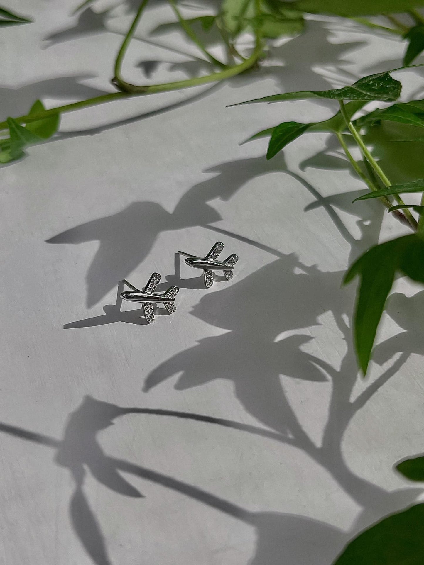 Sterling Silver Rhodium Plated CZ Plane Studs