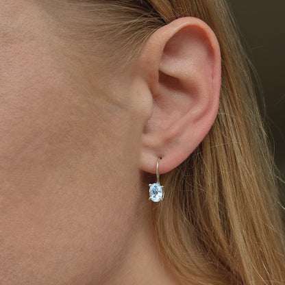 Sterling Silver Oval Blue Topaz Drop Earrings