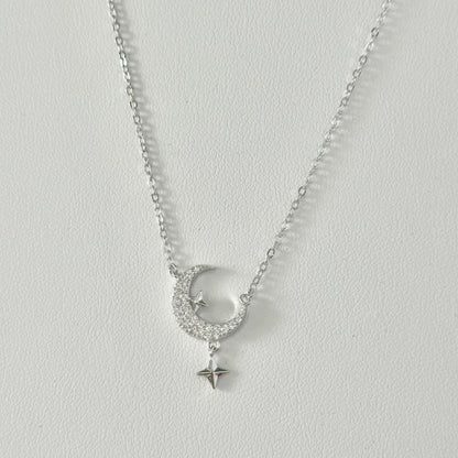 Sterling Silver Rhodium Plated CZ Moon Pendant Necklace