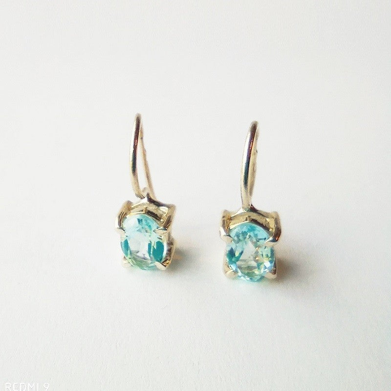 Sterling Silver Oval Blue Topaz Drop Earrings